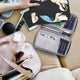 variant:46348636225728 travelon RFID Blocking Family Passport Zip Wallet Midnight Floral